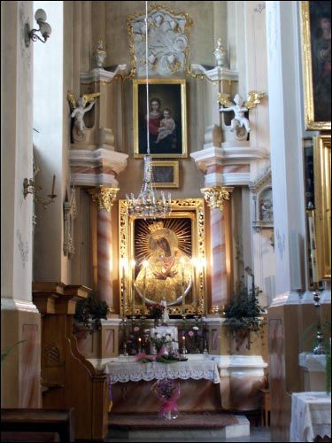  - Catholic church of the Exaltation of the Holy Cross. Side altar whith sacred image of The Blessed Virgin Mary Mother of Mercy