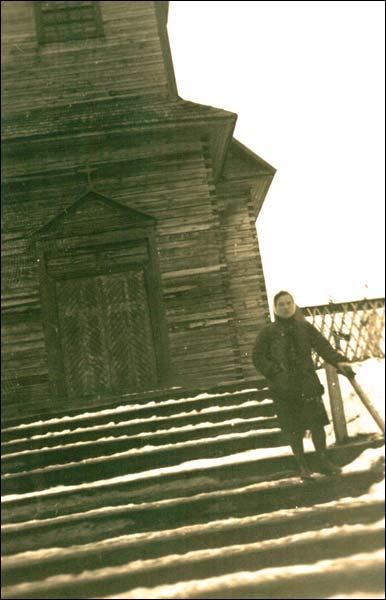 Malkavičy |  Catholic church . In front of the church (photo before 1950)