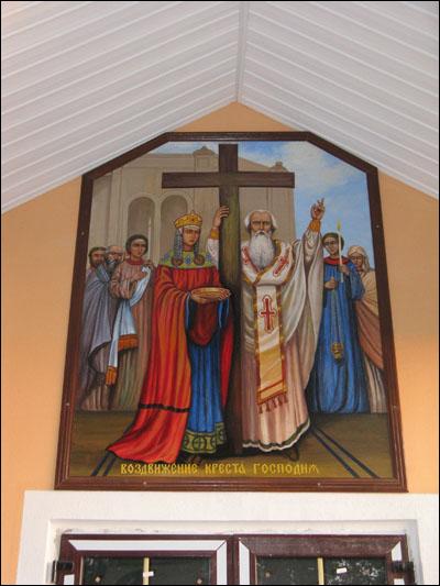  - Orthodox church of the Exaltation of the Holy Cross. Icon of the Exaltation of the Holy Cross under the plastic siding