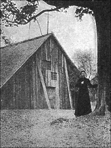  - Catholic church of St. Peter and St. Paul. Father Paszkiewicz and temporary construction where priest told a service during the building of new church. Photo 1900th. Photo 1900th